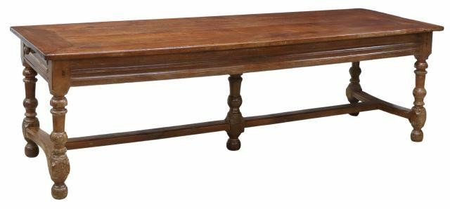 Appraisal: French Provincial farmhouse table th c plank top over drawer