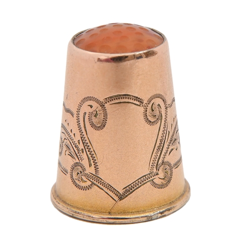 Appraisal: A Swedish gold thimble early th c with amber top