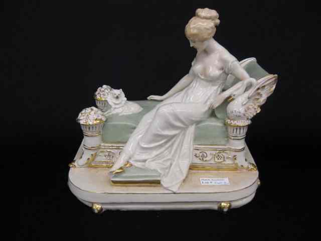 Appraisal: German Porcelain Figurine of Lady on Chaise dog by her