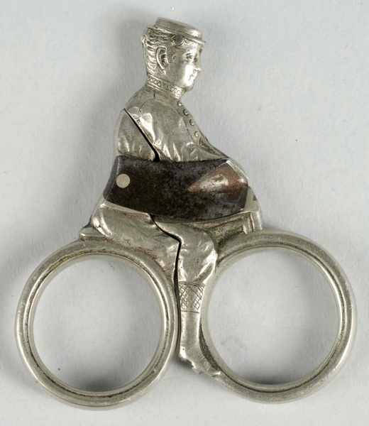 Appraisal: Figural Woman Riding Bicycle Cigar Cutter Description Early s Silver