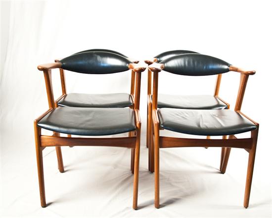 Appraisal: Four Danish Modern Teak Dining Chairs with black seats and