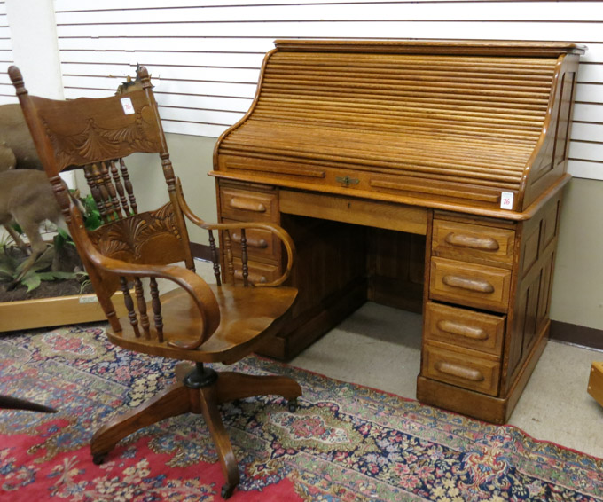 Appraisal: AN OAK ROLL-TOP DESK AND CHAIR American late th century