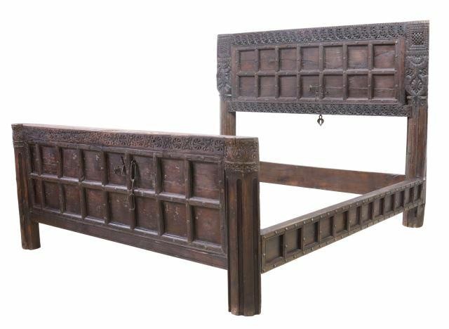 Appraisal: Large carved hardwood bed India having paneled headboard and footboard