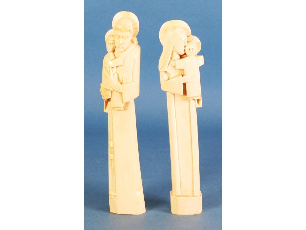 Appraisal: TWO AFRICAN CARVED IVORY RELIGIOUS FIGURES Mary holding the erect