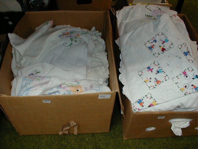 Appraisal: Hand embroidered table cloths tray cloths etc boxes