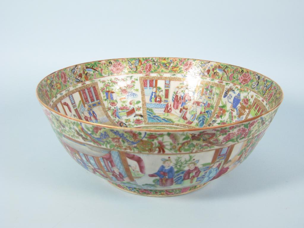 Appraisal: A Cantonese Punch Bowl decorated panels of chinoiserie figures in