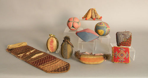 Appraisal: Nine Pennsylvania sewing balls and pin cushions together with an