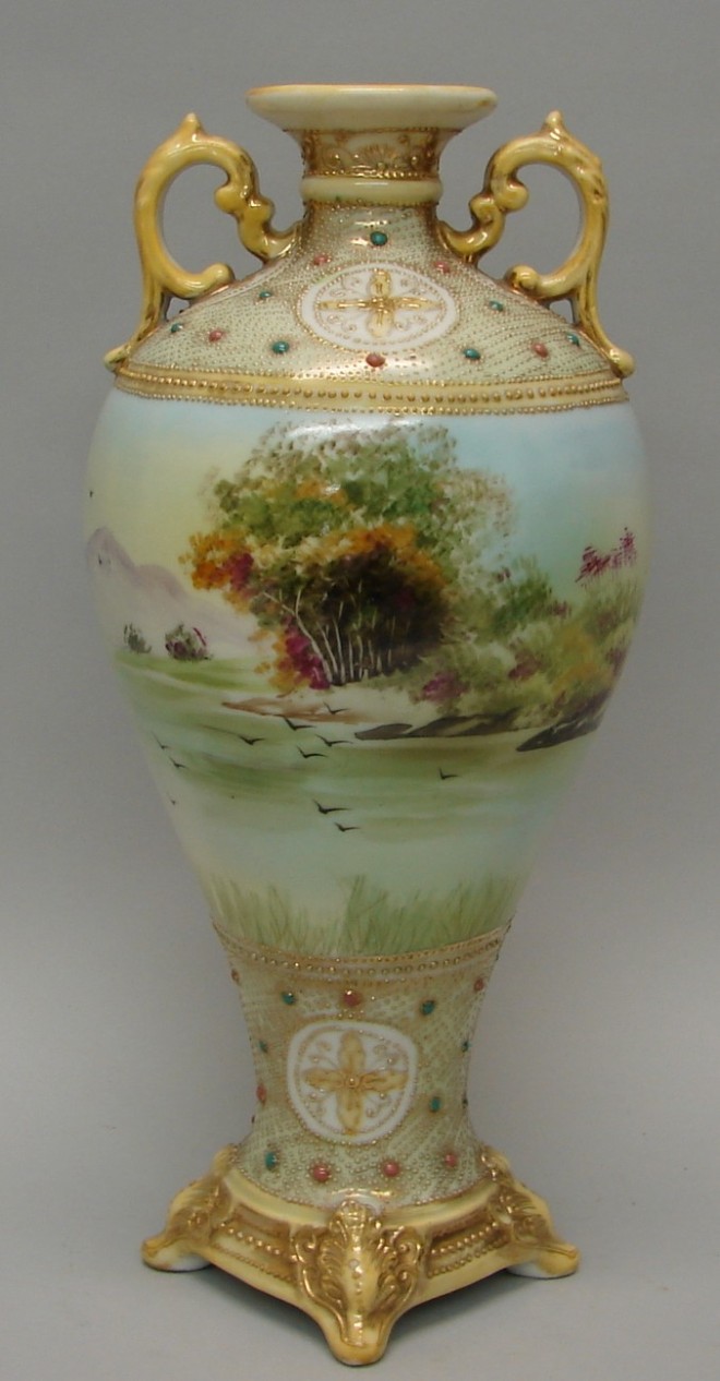 Appraisal: Vase features hand painted panoramic landscape in center portion double