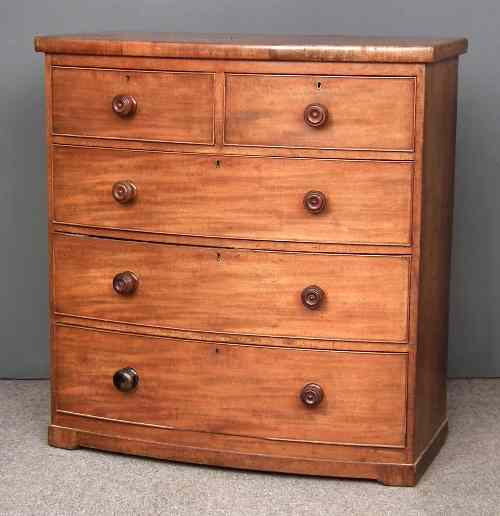 Appraisal: A Victorian mahogany bow-front chest of drawers fitted two short