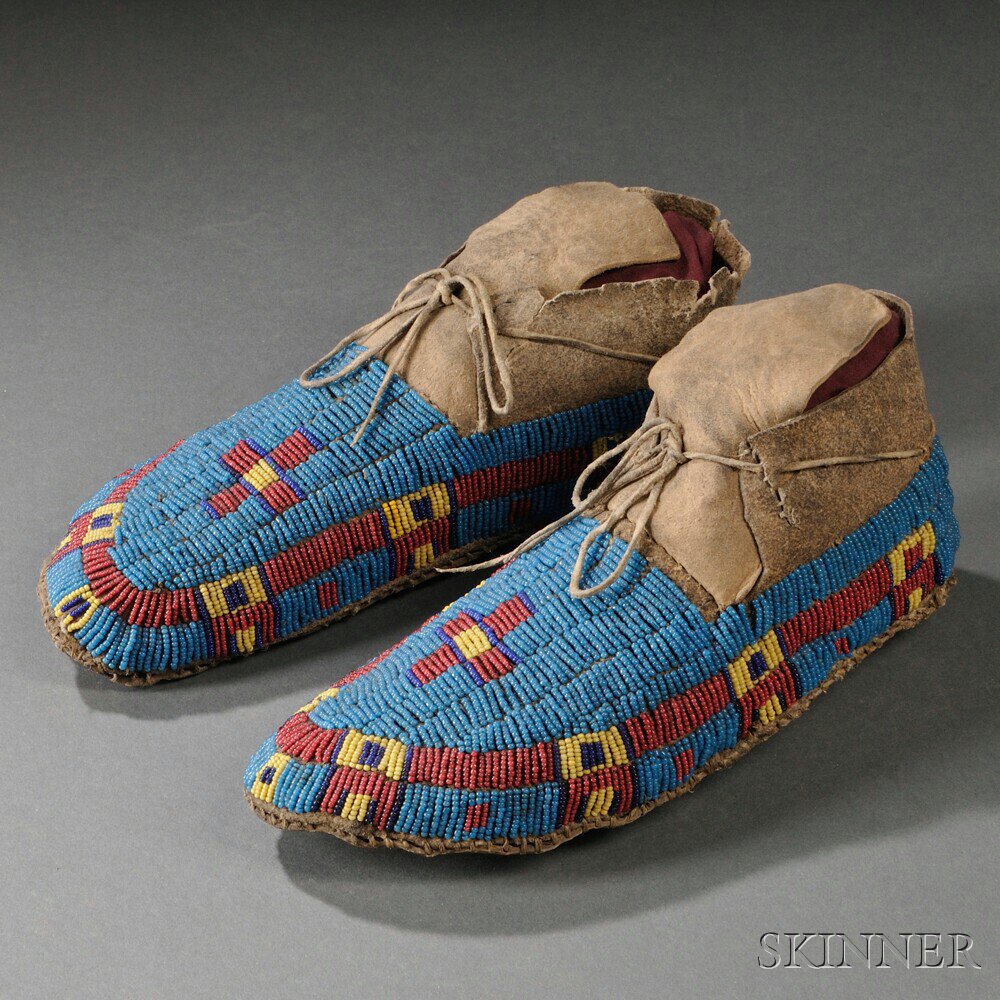 Appraisal: Lakota Beaded Buffalo Hide Moccasins c multicolored geometric and cross