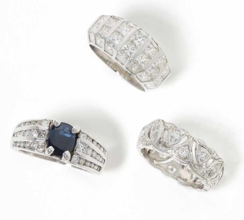 Appraisal: Three platinum and diamond rings set with round marquise and