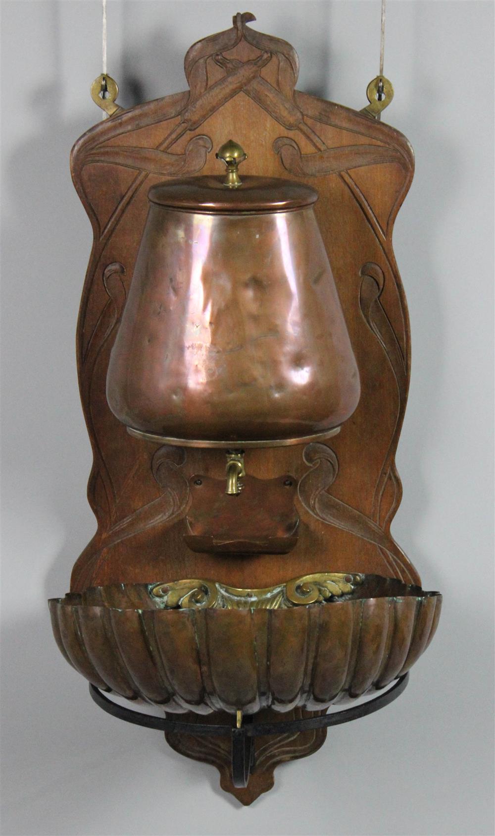 Appraisal: COPPER LAVABO AND A LARGE BRASS-MOUNTED COPPER CAN the lavabo