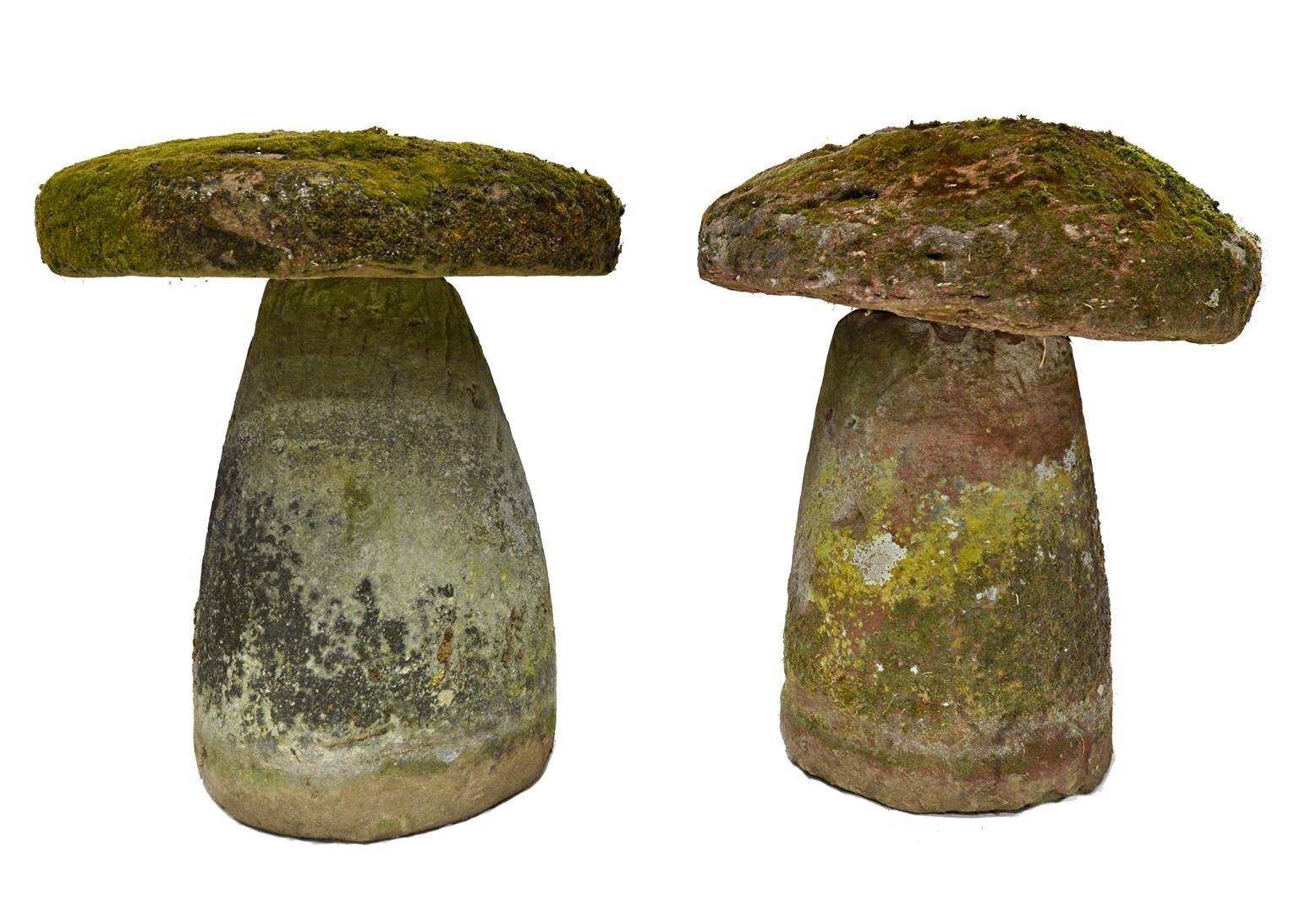 Appraisal: A pair of ironstone staddle stones of typical form each