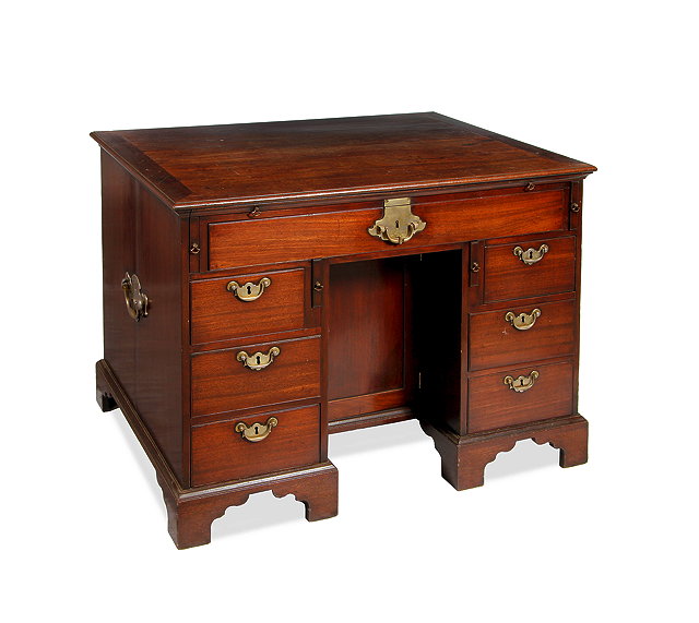 Appraisal: A GEORGE III MAHOGANY PARTNERS DESK having a slide and