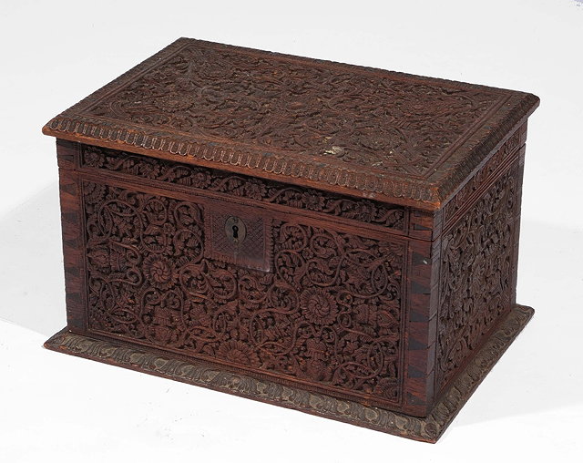 Appraisal: A Burmese carved hardwood box th Centurycarved with all over