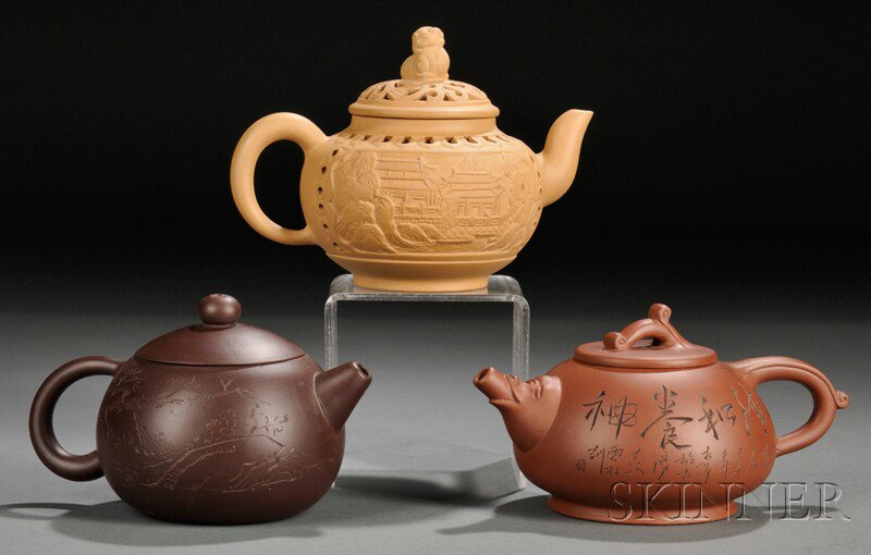 Appraisal: Three Yixing Teapots China one of compressed globular form incised