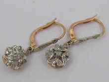 Appraisal: A pair of French hallmarked carat gold diamond earrings drop