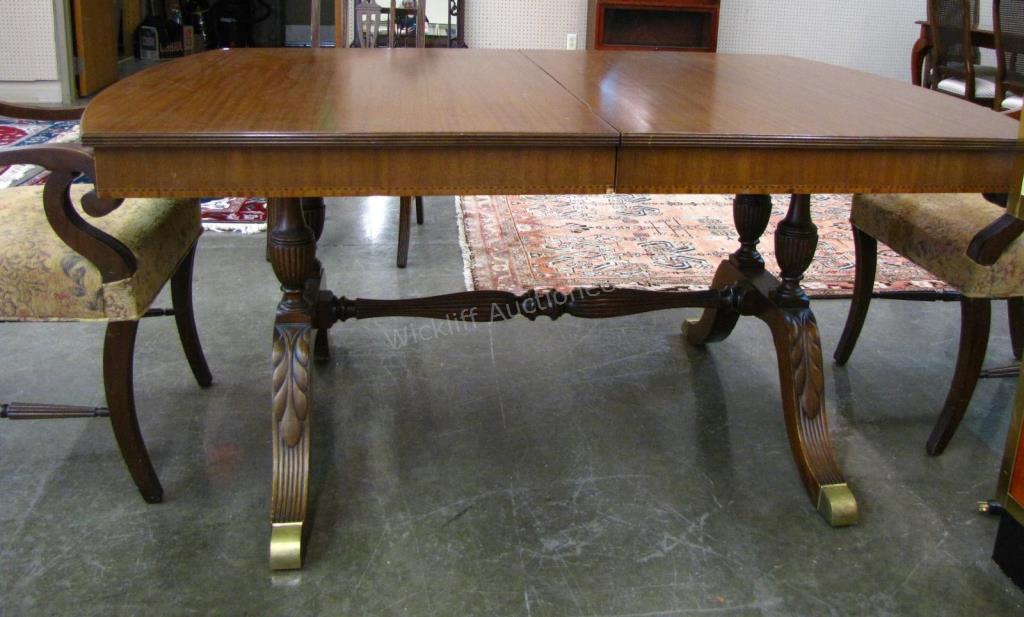 Appraisal: A Sheraton period-style dining room group including double pedestal table