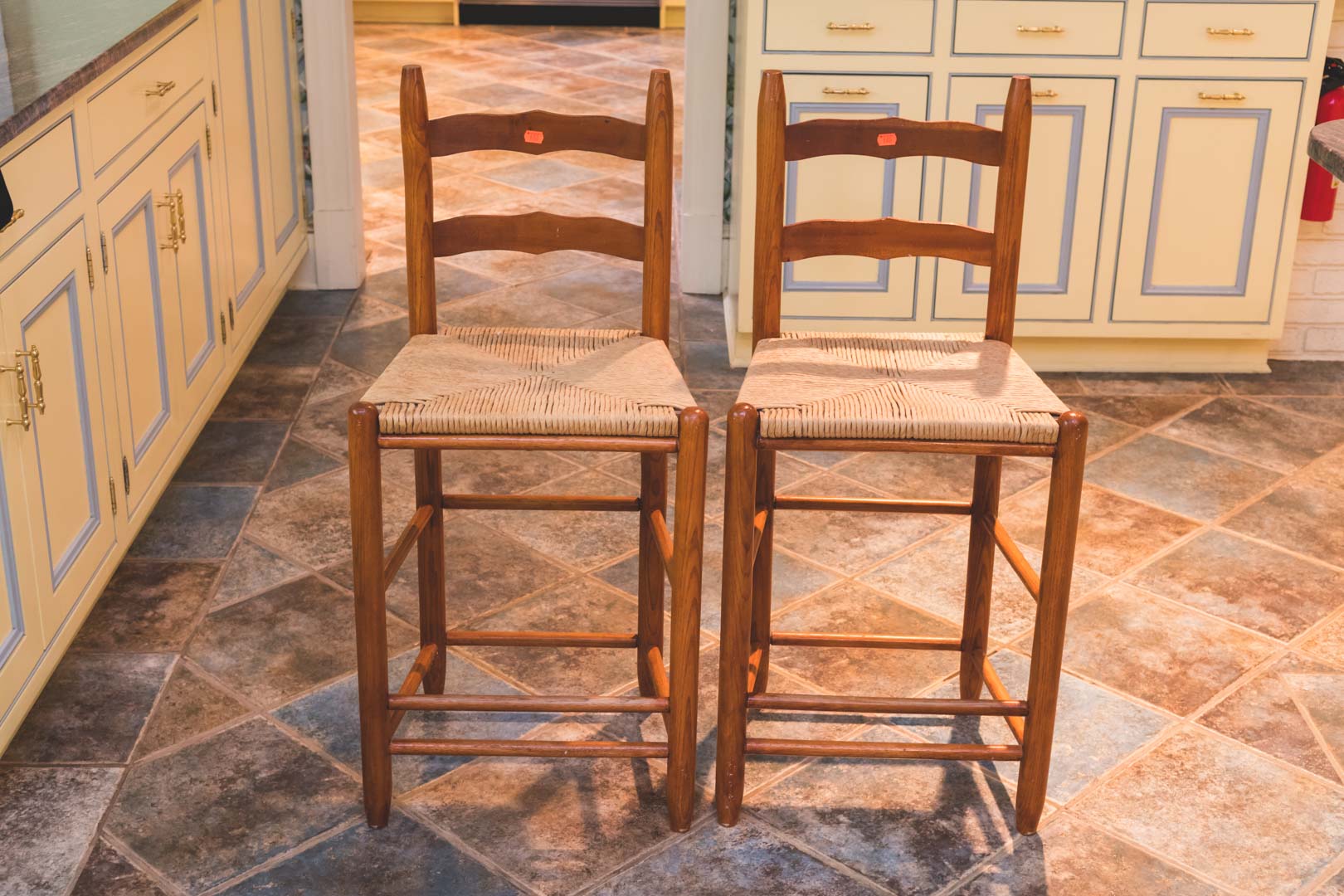 Appraisal: Pair of country style maple rush seat barstools in H