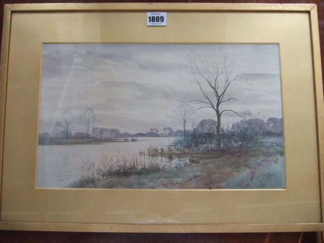 Appraisal: Robert Winchester Fraser - A river scene in late autumn