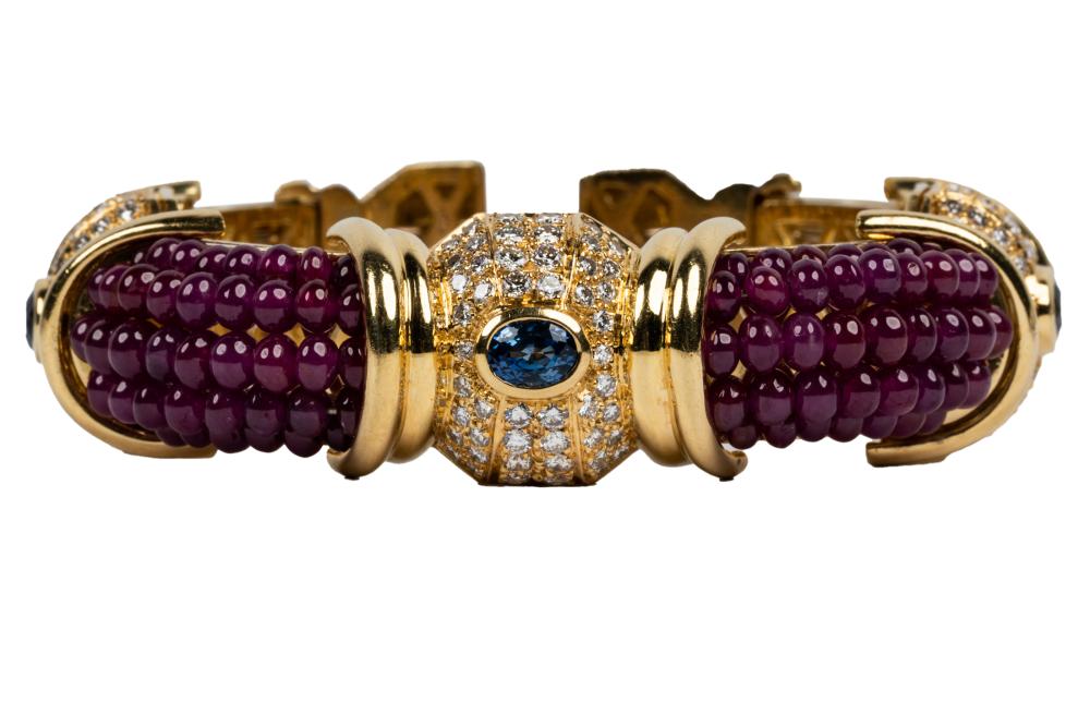 Appraisal: KARAT YELLOW GOLD RUBY SAPPHIRE DIAMOND BRACELETcontaining round brilliant cut