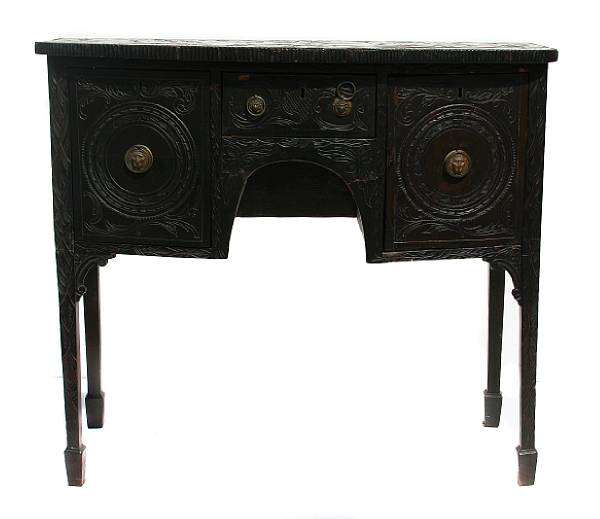 Appraisal: A George III sideboard with later carvings damage to case