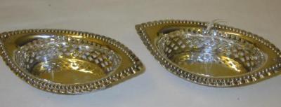 Appraisal: A PAIR OF EDWARDIAN BONBON DISHES of navette form with