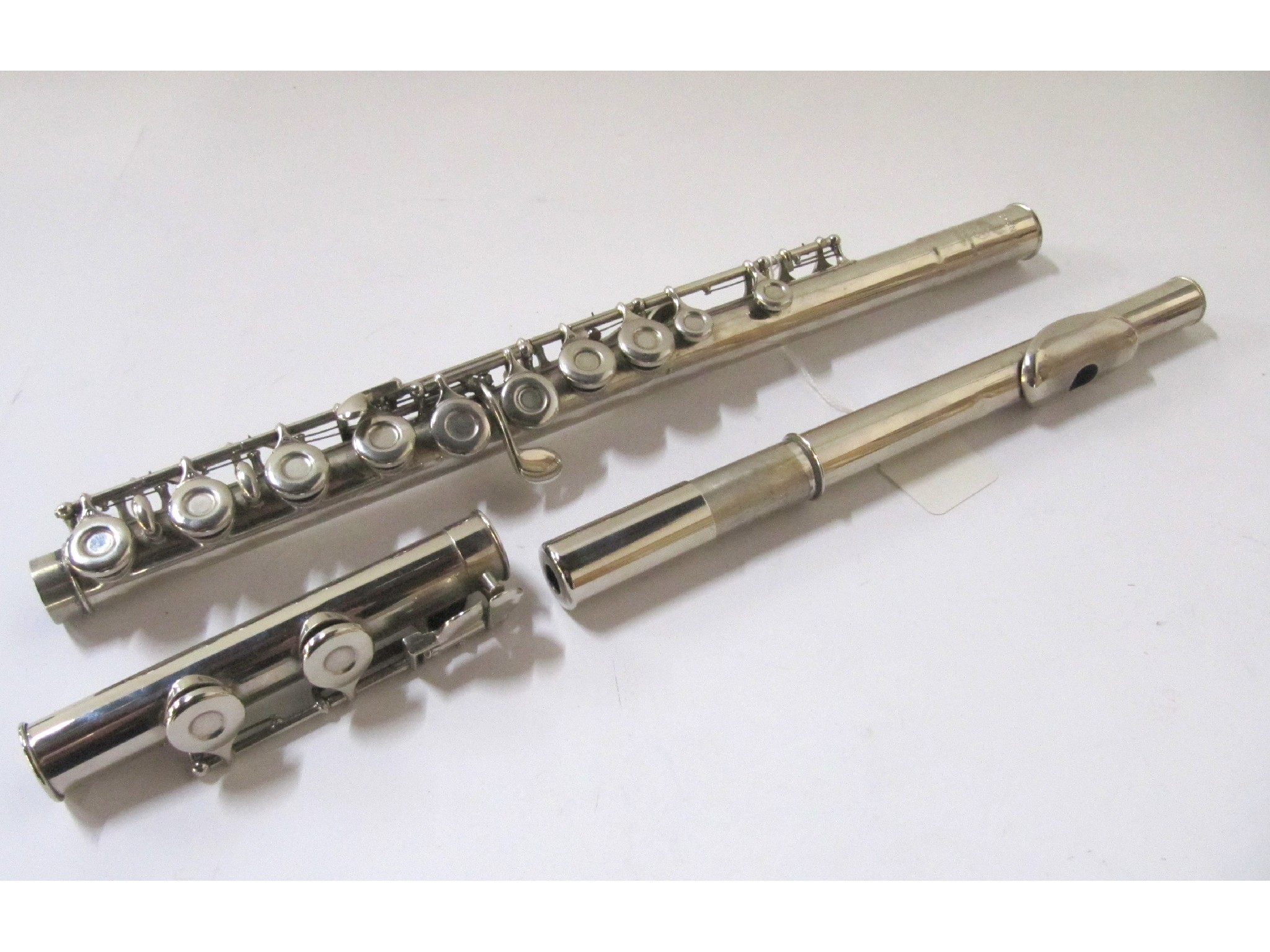 Appraisal: A Boosey Hawkes white-metal Regent flute in fitted case