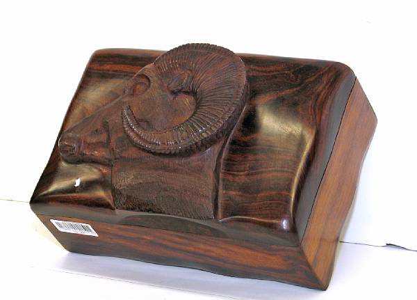 Appraisal: A wooden table box carved with ram's head modern length