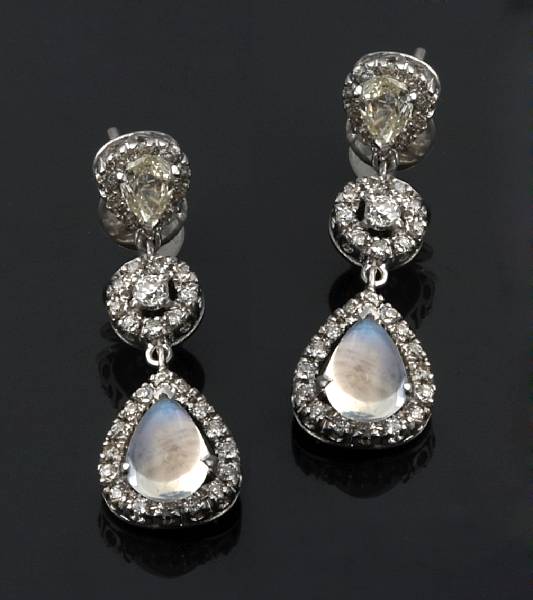 Appraisal: A pair of moonstone diamond and k white gold earrings