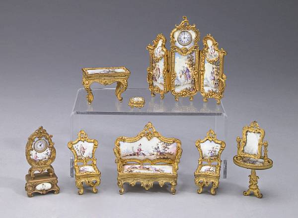 Appraisal: A suite of gilt bronze and enamel miniature furniture early