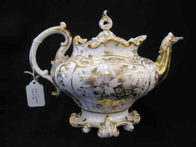 Appraisal: Old Paris Porcelain Teapot elaborate gold florals mid th century