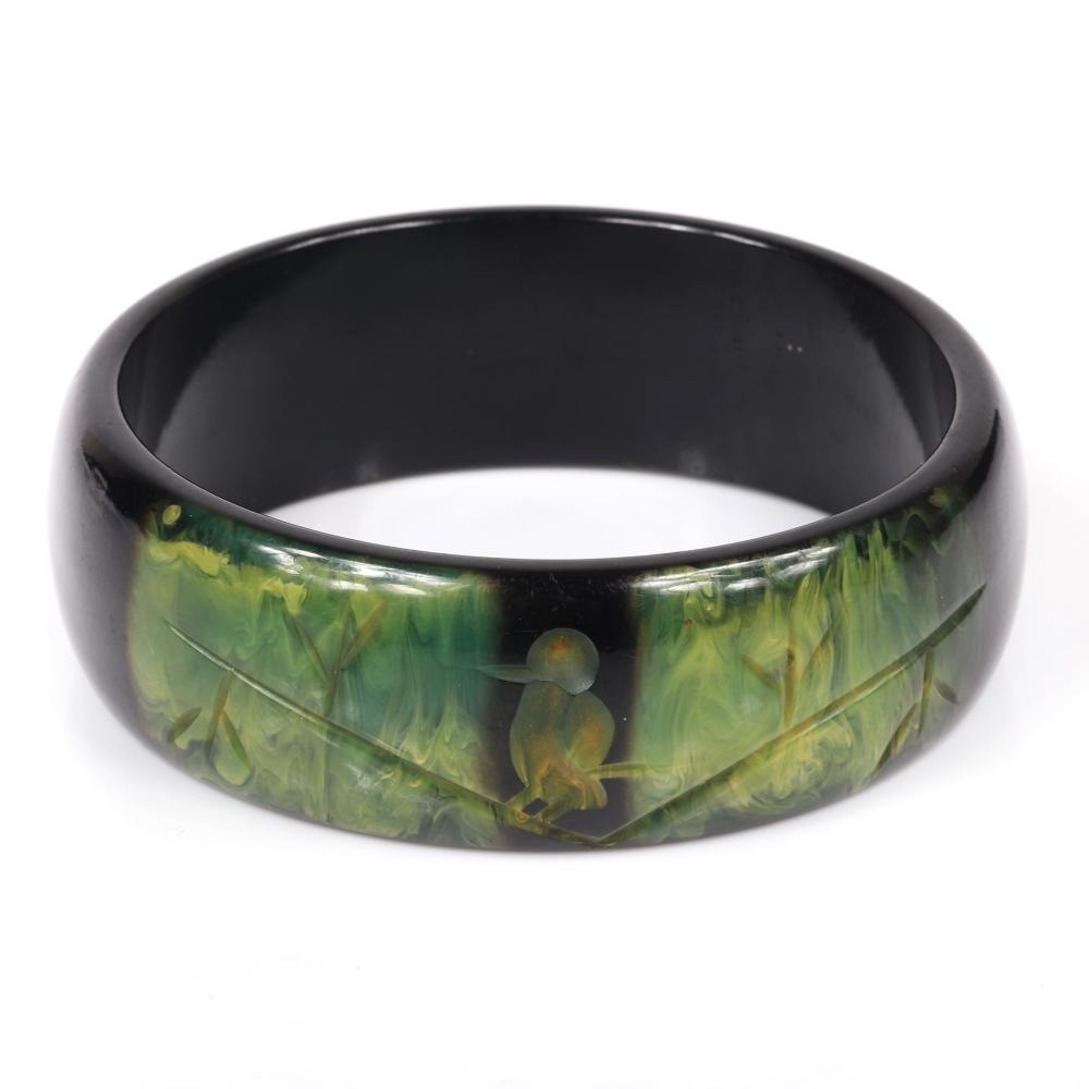 Appraisal: VINTAGE BAKELITE WIDE BANGLE BRACELET WITH MARBLED CREAMED SPINACH TO