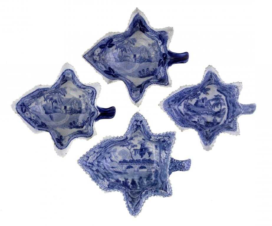 Appraisal: A BLUE PRINTED EARTHENWARE ITALIAN RUINS PATTERN PICKLE DISHES AND