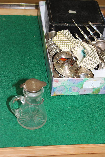 Appraisal: A SMALL SILVER MOUNTED GLASS WHISKEY DECANTER with label various