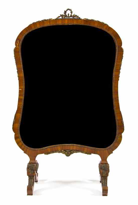 Appraisal: An English Fire Screen the shaped rectangular frame inset with