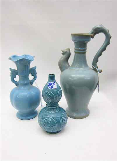 Appraisal: THREE CHINESE BLUE POTTERY PIECES pitcher with dragon handle and