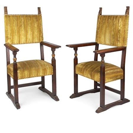 Appraisal: Pair of Continental Baroque Style Parcel Gilt Walnut Armchairs Estimate