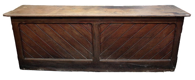 Appraisal: A LARGE VICTORIAN PINE SHOP COUNTER with panelled front and