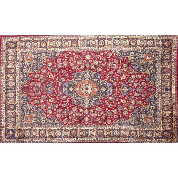 Appraisal: PERSIAN Mashed room-size carpet with orange central medallion on a