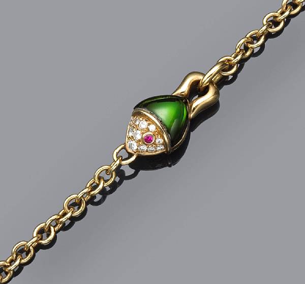 Appraisal: A green tourmaline diamond ruby and eighteen karat gold necklace