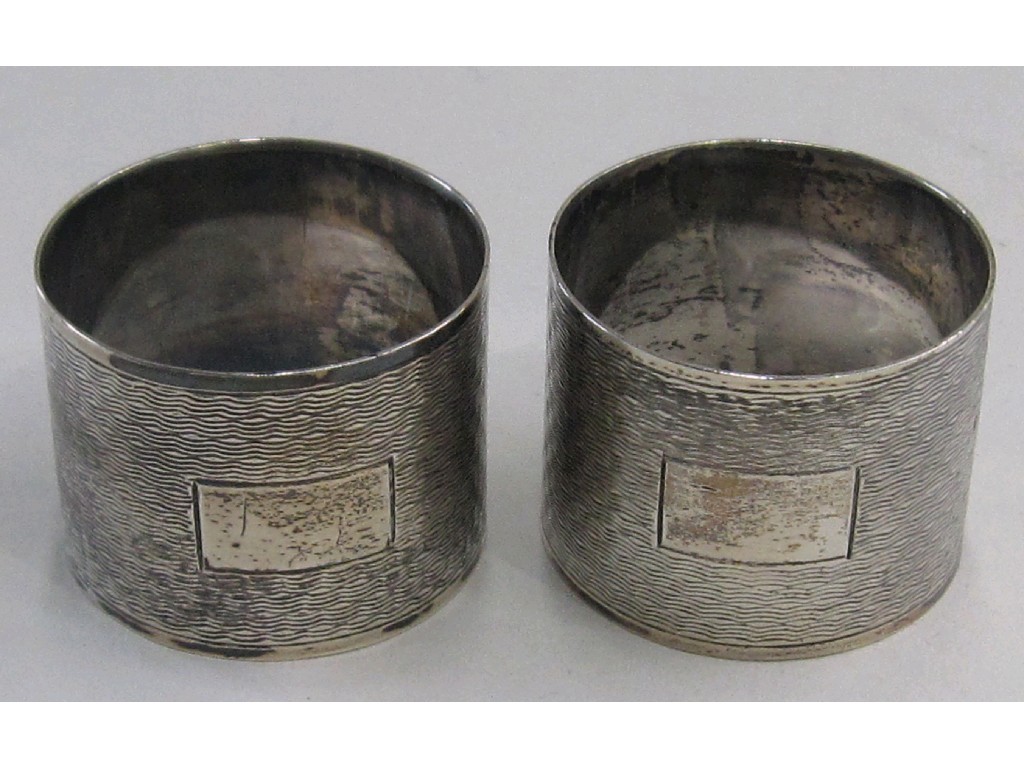 Appraisal: Pair of silver napkin rings Birmingham