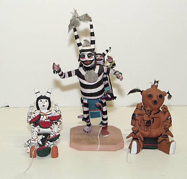 Appraisal: Three Pueblo figural sculptures Including a wooden Hopi Koshare clown