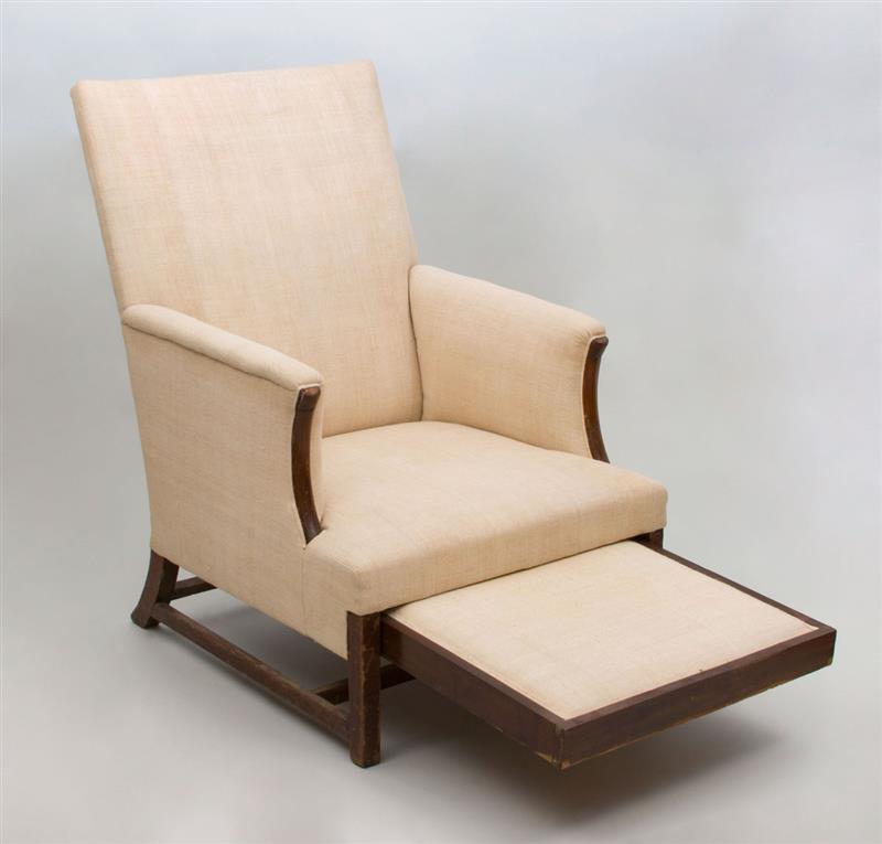 Appraisal: CHIPPENDALE STYLE MAHOGANY ARMCHAIR Fitted with a retractable foot stool