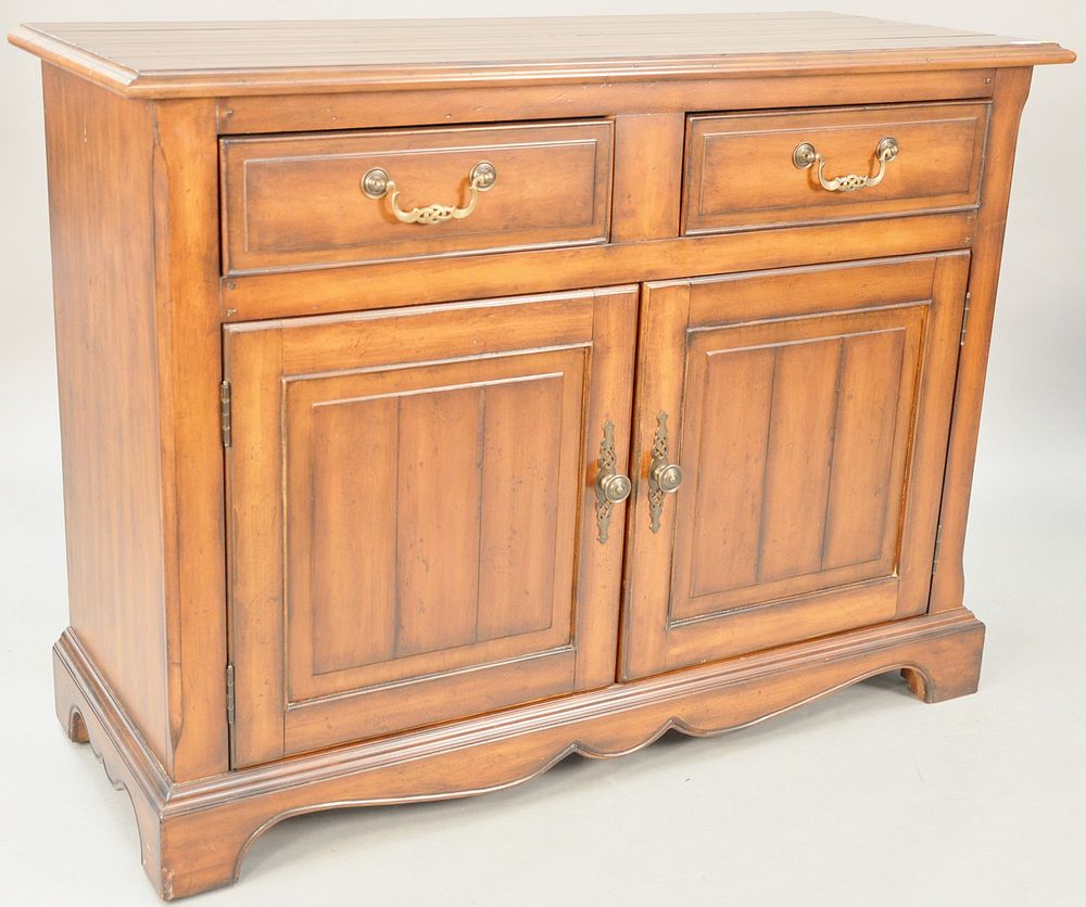 Appraisal: Contemporary cabinet having two drawers and two doors ht in