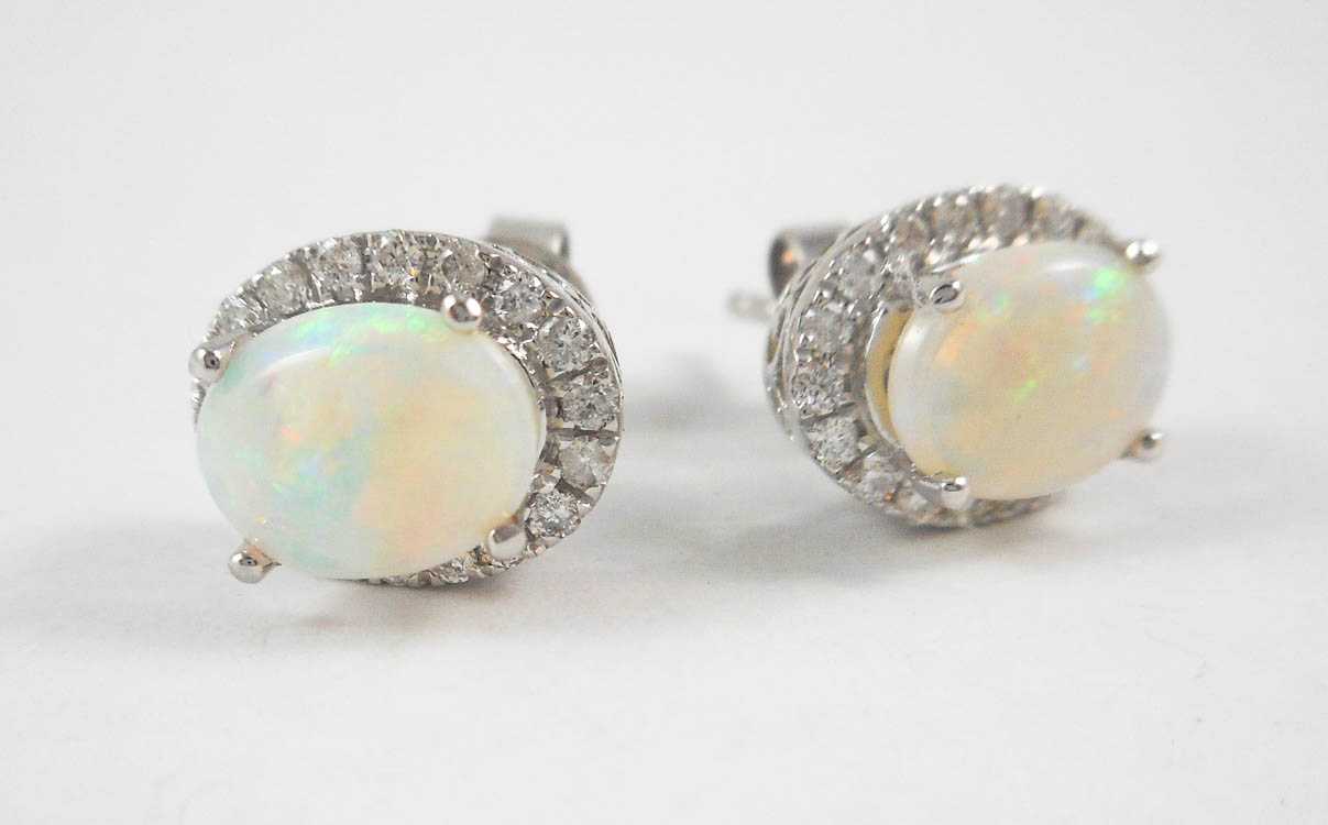 Appraisal: PAIR OF OPAL AND DIAMOND EAR STUDS each k white