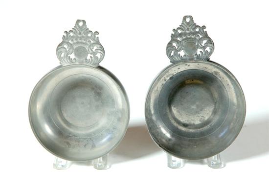 Appraisal: TWO PEWTER PORRINGERS New England ca Crown handles with cast