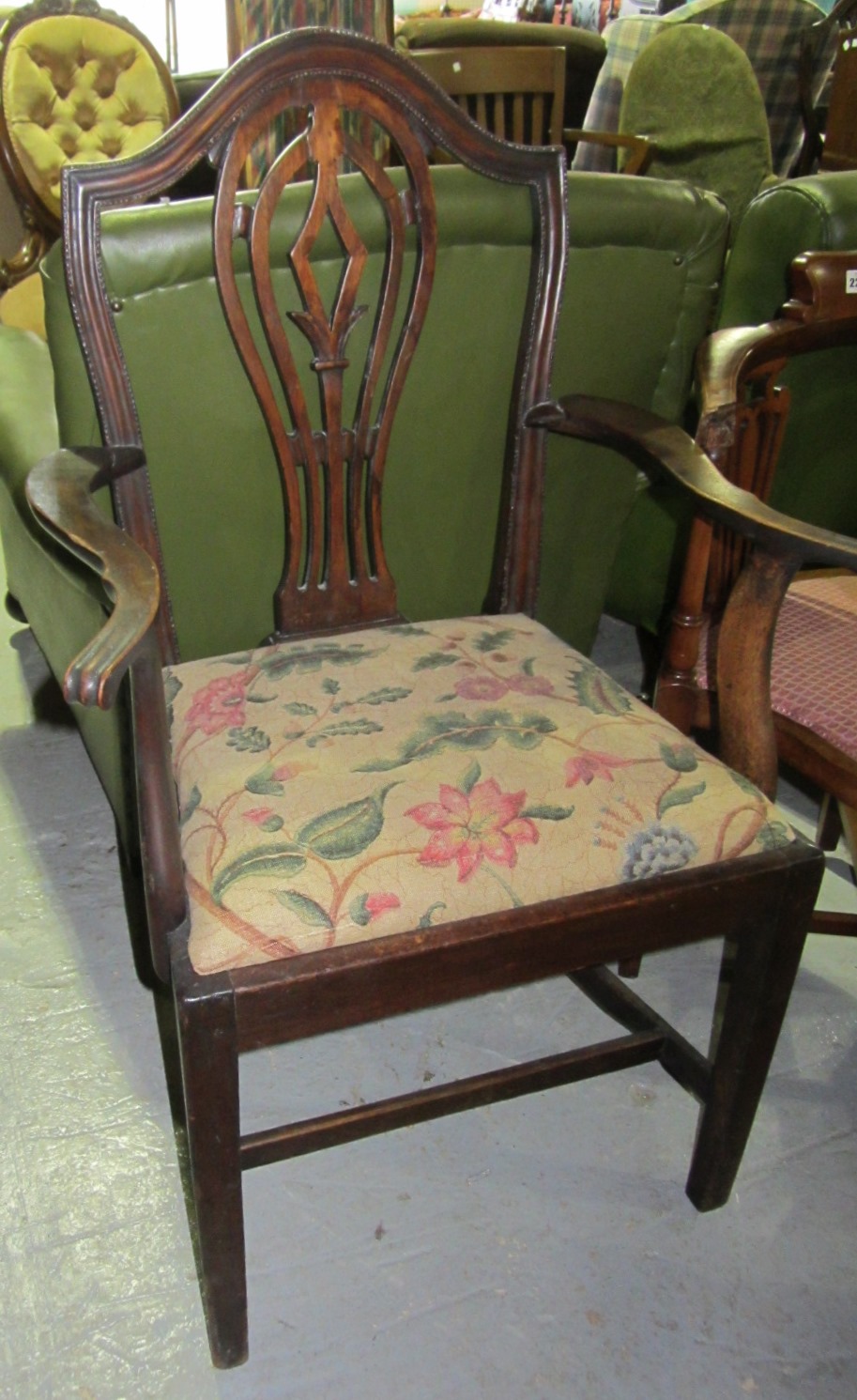 Appraisal: A th century mahogany carver chair a single drawer side