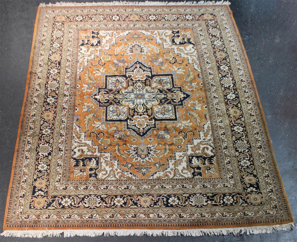 Appraisal: LARGE PAKISTANI HERIZ DESIGN WOOL RUG having a central medallion