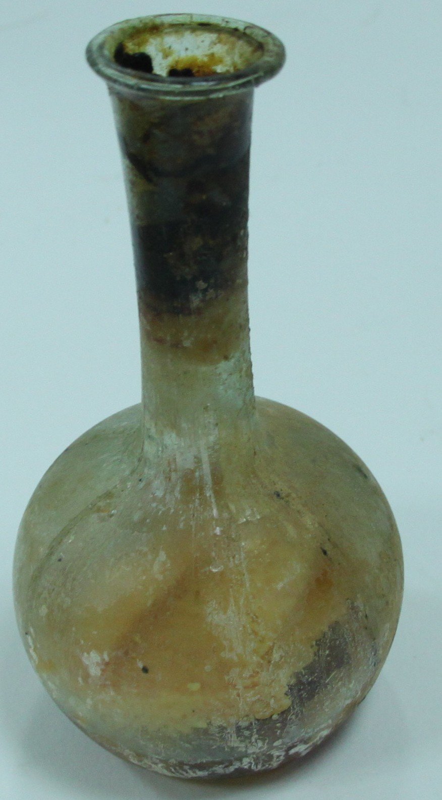 Appraisal: An ancient Roman glass globular flask with narrow neck cm